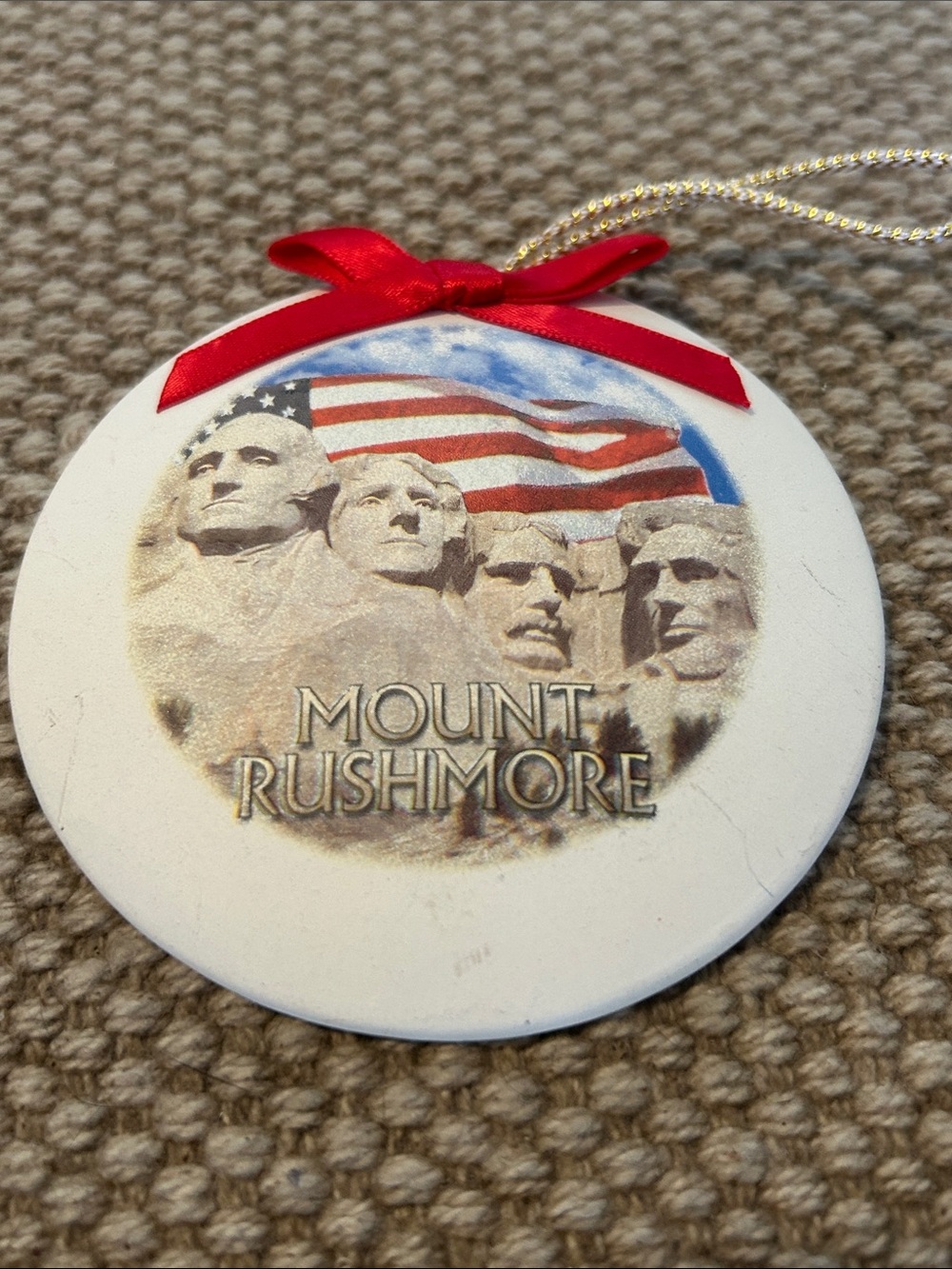 Mount Rushmore Ceramic Holiday Ornament with Red Bow